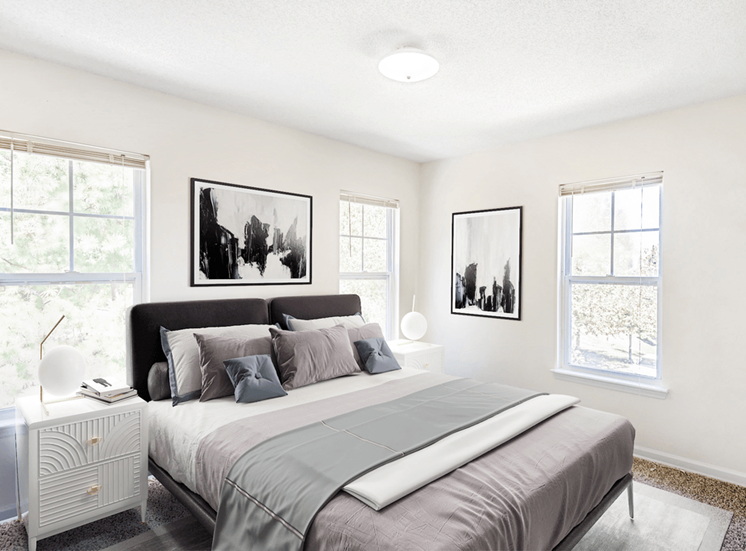 Virtually staged; Carpeted Bedroom with Windows, bed and nightstands with blue/grey accents and artwork